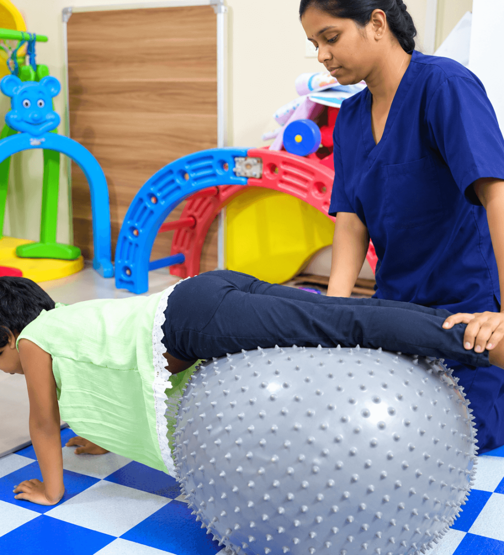 Child Physiotherapy Exercise with Therapy Ball